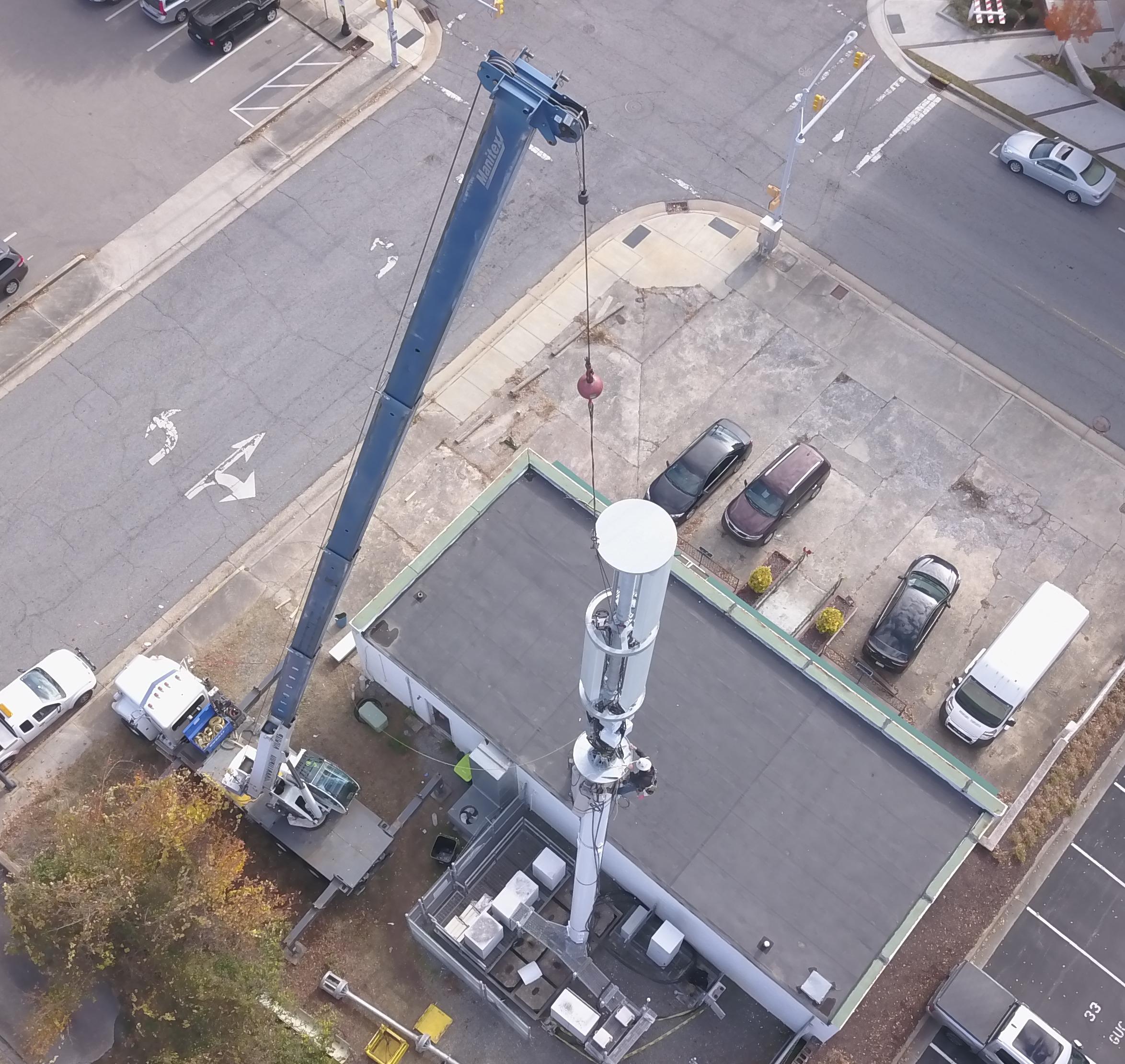 top view of employees working on tower.